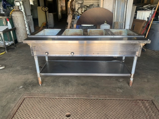 $1750 / Eagle SDHT4-120 63-1/2” Stationary Four-Well Electric Dry Hot Food Table With Open Stainless Steel Base - 120V