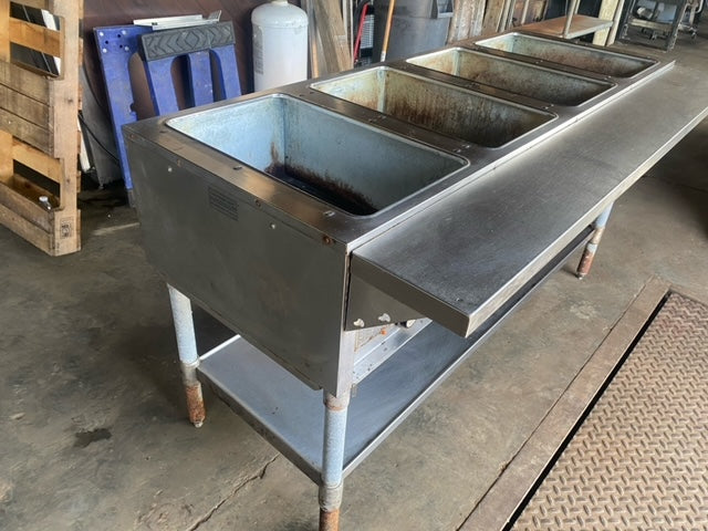 $1750 / Eagle SDHT4-120 63-1/2” Stationary Four-Well Electric Dry Hot Food Table With Open Stainless Steel Base - 120V