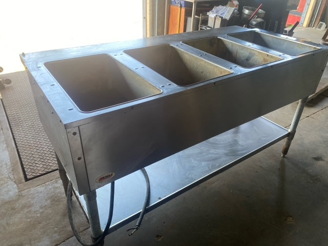 $1750 / Eagle SDHT4-120 63-1/2” Stationary Four-Well Electric Dry Hot Food Table With Open Stainless Steel Base - 120V